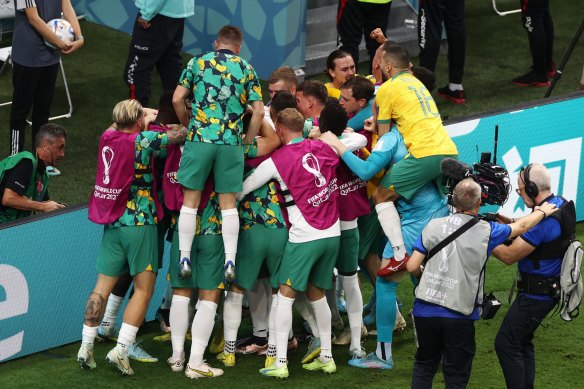 Mathew Leckie of Australia celebrates after scoring their team’s first goal.