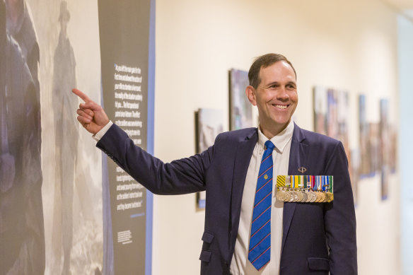 Veteran Dr Bob Worswick points at a photo of himself in Somalia. An exhibition at the Australian War Memorial marks the 30th anniversary of the deployment of peacekeeping troops. 