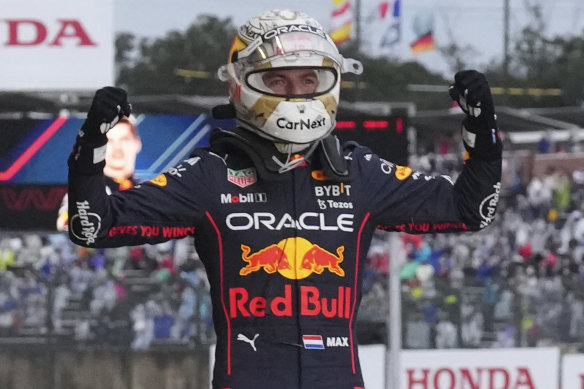 Red Bull driver Max Verstappen celebrates winning the Japanese Formula One Grand Prix.