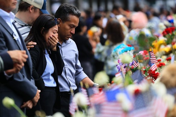 Sombre ceremonies were held across the country to mark the 25th anniversary.