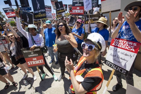 Writers Guild of America and Screen Actors Guild members and supporters rally outside Paramount Studios in Los Angeles.