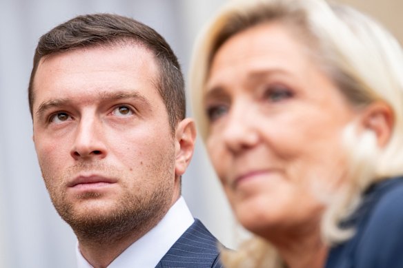 Jordan Bardella, president of France’s National Rally, left, with parliamentary party leader Marine Le Pen.