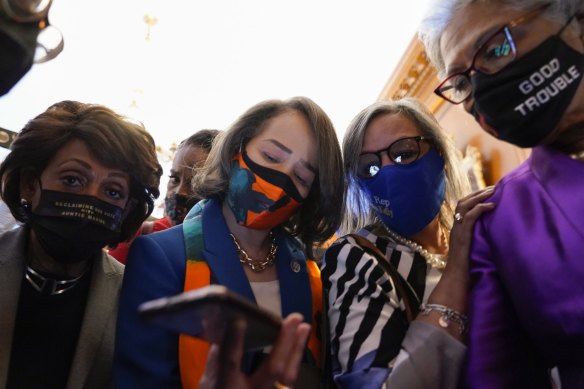 Members of the Congressional Black Caucus listen on Capitol Hill in Washington on Tuesday, April 20, 2021, as the verdict to announced in the murder trial of former Minneapolis police Officer Derek Chauvin in the death of George Floyd. (AP Photo/J. Scott Applewhite)