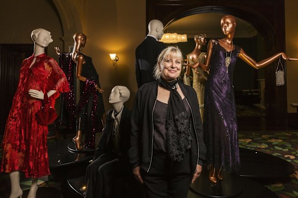 Marion Boyce with costumes from Miss Fisher’s Murder Mysteries during a 2016 exhibition of her work in Brisbane.