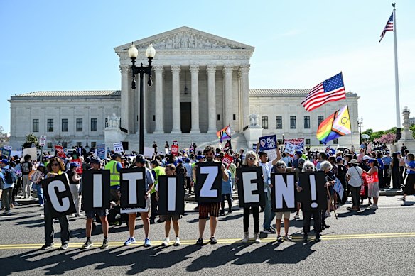 Demonstrators outside the US Supreme Court for a hearing on Trump’s attempt to end birthright citizenship.