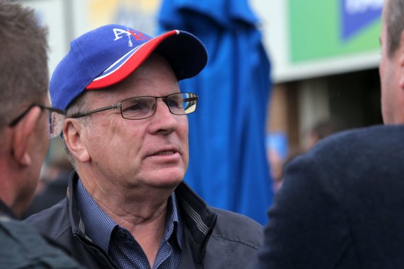 Banned for life: Trainer Robert Smerdon (centre).