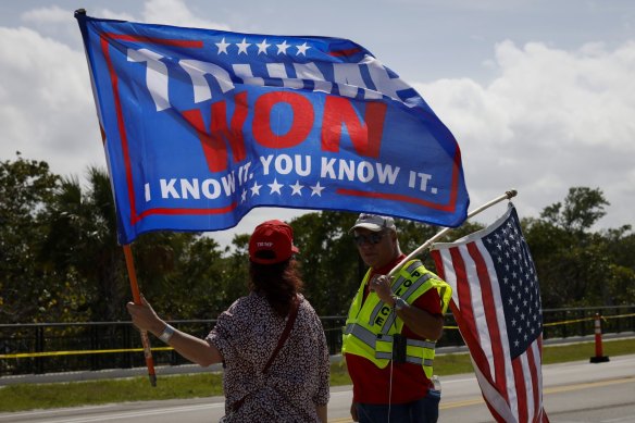 Trump supporters outside Mar-a-Lago on Friday.