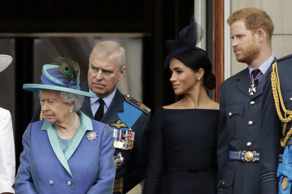 The Queen “avoided confrontation”, especially those involving Prince Andrew (behind her) and Prince Harry and his wife Meghan.