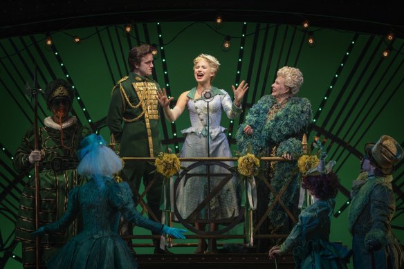 Nevin as Madame Morrible, right, with Liam Head as Fiyero and Courtney Monsma as Glinda in Wicked.