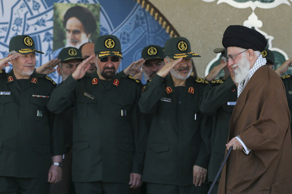 Former commander of the Revolutionary Guard Mohsen Rezaei, second left, is a perennial candidate in Iran’s elections. 