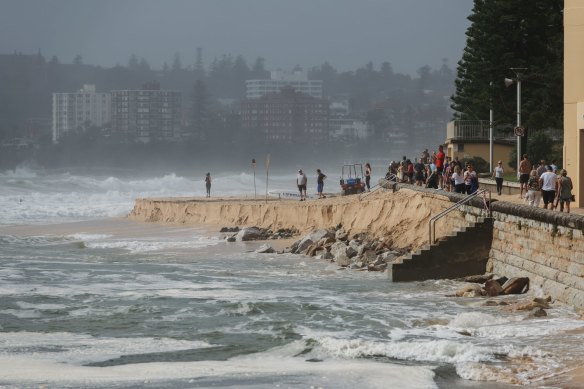 Erosion and tidal surges at Queenscliff beach as large swells and a high tide washed sea water into Manly Lagoon.