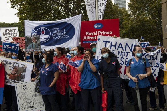 NSW nurses and midwives march to Parliament House on Thursday. 