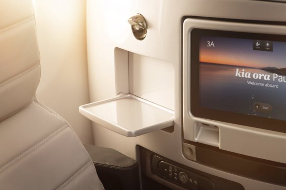 Your 11-inch entertainment screen, tucked away during take-off and landing.