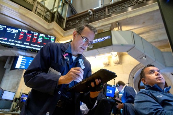 Wall Street’s recent rally lost some momentum following a pair of potentially discouraging reports.