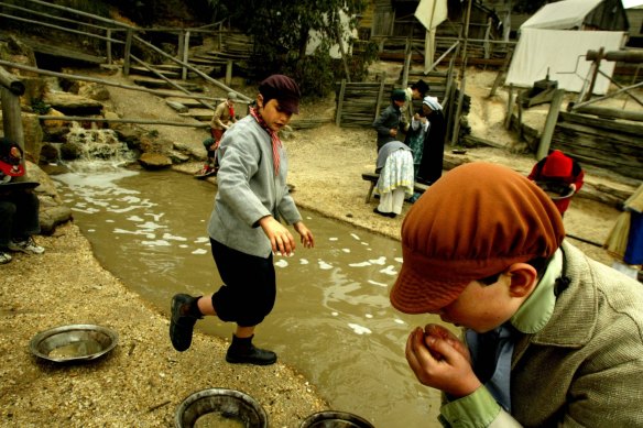 Kids panning for gold at Sovereign Hill