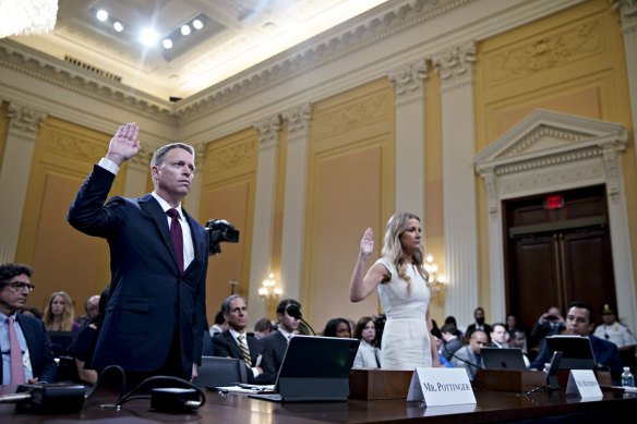 Former Trump deputy national security adviser Matthew Pottinger and former deputy press secretary Sarah Matthews swear in to January 6 hearing in Washington.