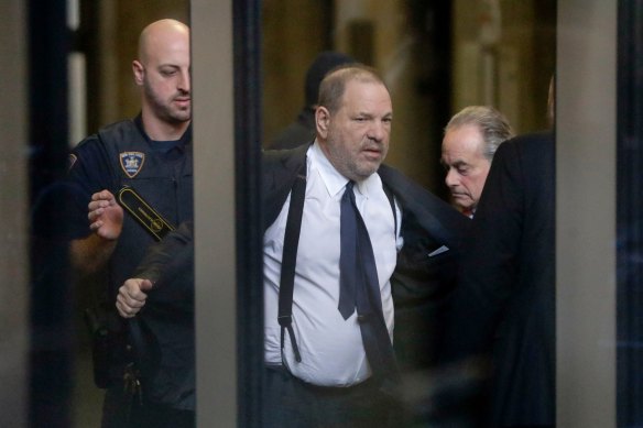 Harvey Weinstein passes through a security checkpoint at New York Supreme Court in December 2018.