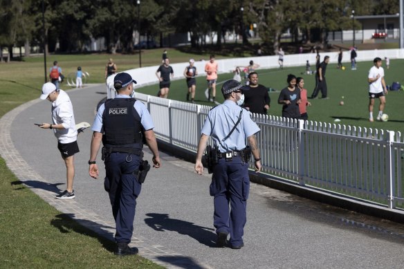 Police patrol at Gore Hill Oval in St Leonards on Saturday.