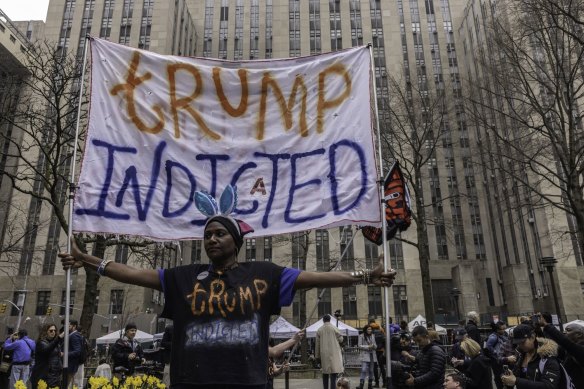 A protester rallies against Donald Trump in New York.