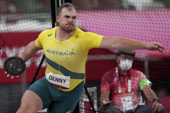 Matthew Denny competes in the discus final.