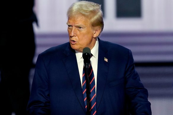 Trump does a walkthrough of convention stage, lit to look like the White House, on day three of the convention.