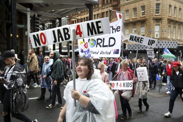 Protesters gathered in Hyde Park and spilled onto surrounding streets to rally against vaccine mandates. 