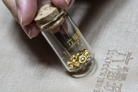 Gold beans for sale at a Luk Fook jewellery store in Shanghai, China.