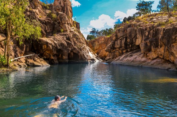 Covering nearly 20,000 square kilometres, Kakadu National Park’s footprint is similar to what country?