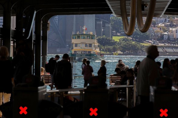 Sydney commuters move through Circular Quay.