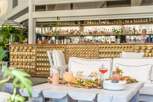 Marina views, tiki cocktails, and total tropical relaxation at Barbados Port Douglas.