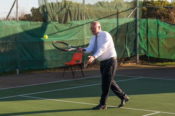  Scott Morrison has a hit of tennis in Lyons on Thursday morning.