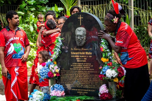 Family members pay their respects at Eddie Mabo’s grave.