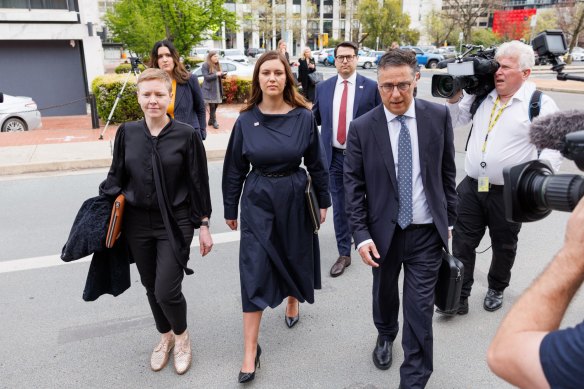 Brittany Higgins (centre) arriving at the ACT Supreme Court during the first week of the trial.