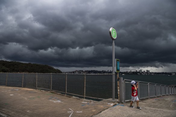 Storm clouds over Sydney Harbour from Bradleys Head on Friday. 