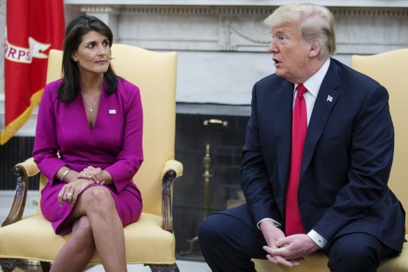 Then-US President Donald Trump in a White House meeting with Nikki Haley, who was the US ambassador to the United Nations, in 2018.