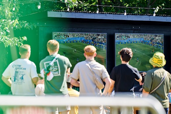 Fans watch France v Senegal at a watch party in Brooklyn.