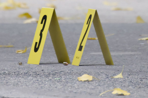 Bullets lie on the pavement outside the Hilton Hotel in Manhattan.