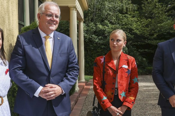 Prime Minister Scott Morrison and 2021 Australian of the Year Grace Tame during the 2022 Australian of the Year awards morning tea at the Lodge in Canberra on Tuesday 25 January 2022. fedpol Photo: Alex Ellinghausen