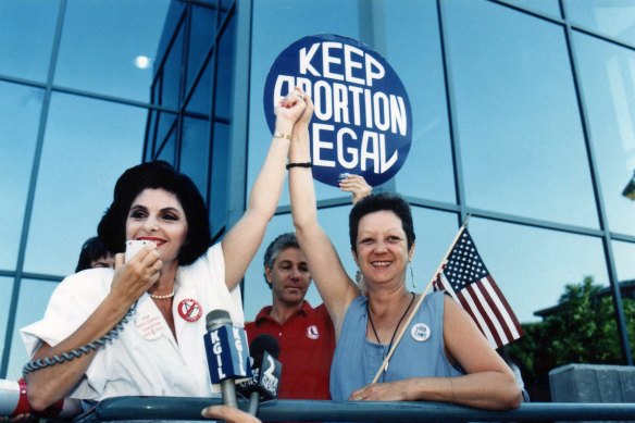 Attorney Gloria Allred and Norma McCorvey, right, at a pro-choice rally in 1989. 