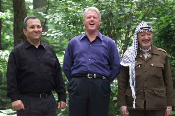 Ehud Barak, then the Israeli prime minister, with US president Bill Clinton and Palestinian leader Yasser Arafat as they tried and failed to strike a historic peace deal at Camp David in 2000. 