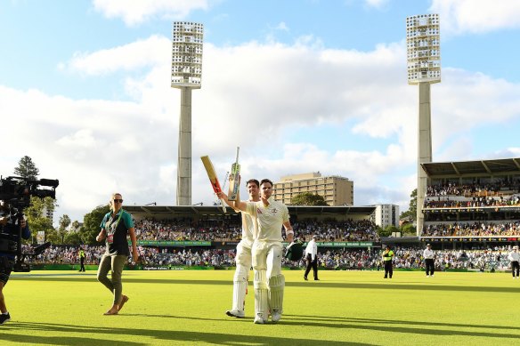 Unbeaten: Mitchell Marsh and Steve Smith leave the field at stumps at the WACA in 2017.