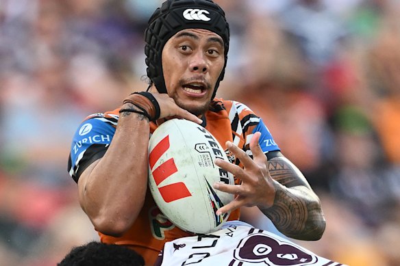 Jarome Luai loses the ball in a tackle.