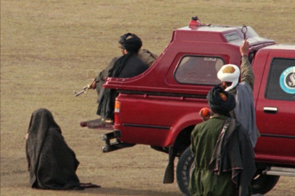 A public execution in 1998, where a man is to be shot by the brother of a man he was found guilty of murdering. 