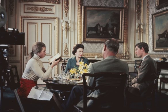 Anne (left) with the Queen, Prince Philip and Prince Charles during filming of the documentary, <i> Royal Family,</i> in 1969.