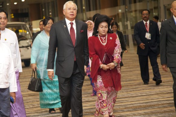 Then Malaysian prime minister Najib Razak, centre, with his wife  Rosmah Mansor in 2014.