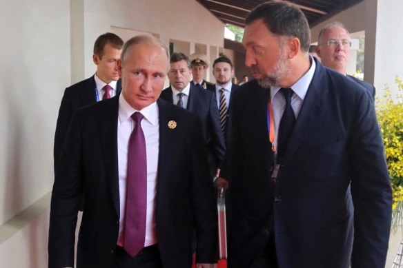 Putin (left) and Oleg Deripaska, at a business summit in Vietnam in 2017.