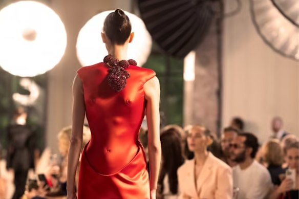 The Schiaparelli show included a reverse cleavage dress with a beating ruby heart.