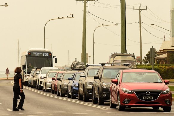 Traffic queue for petrol at a Shell service station on Beach Road in Batemans Bay. Earlier on Thursday the station had run out of diesel. 