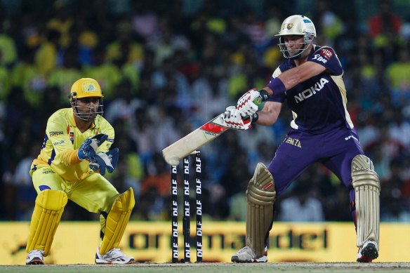 Kolkata Knight Riders’ Jacques Kallis and Chennai Super Kings captain Mahendra Singh Dhoni during the 2011 IPL.