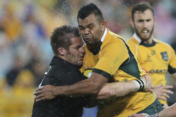 Richie McCaw clashes with Kurtley Beale during their Bledisloe Cup Test in 2014. 